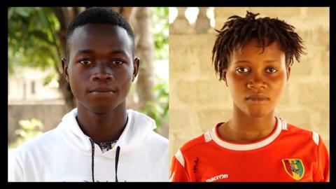 Two Ebola orphans, Kadiatou and Ibrahima look at camera.