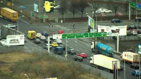 The scheme is designed to ease congestion at the junctions of Belfast's M1, M2 and M3 with a new bridge and underpass