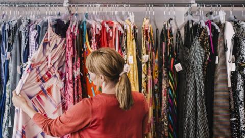 Woman looking at clothes