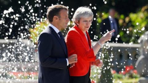 Emmanuel Macron and Theresa May