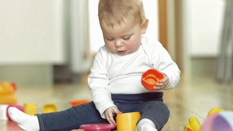 A baby playing