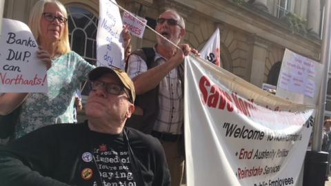 Protesters outside Northamptonshire County Council