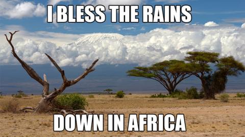 A meme of Mount Kilimanjaro with the words "I bless the rains down in Africa"