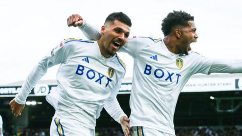 Joel Piroe (left) celebrates his goal for Leeds with team-mate Georginio Rutter