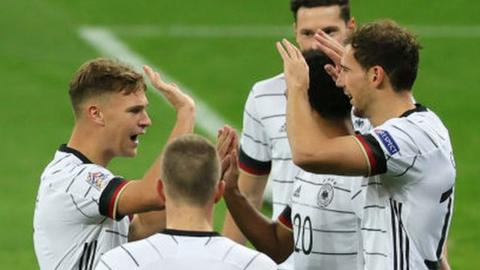 Germany players celebrate Leon Goretsky's goal