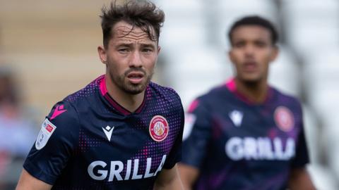 Kane Smith playing in a pre-season friendly for Stevenage