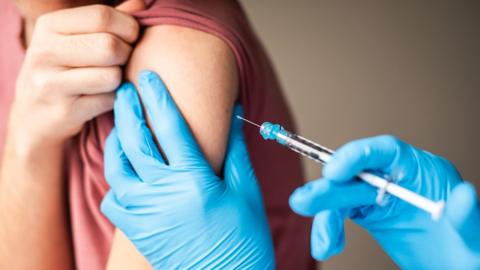A Covid-19 vaccination injection