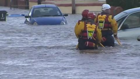 RNLI crews help the rescue effort in Rhyl floods in 2013