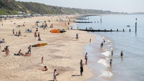 People enjoying the beach at Boscombe, Dorset