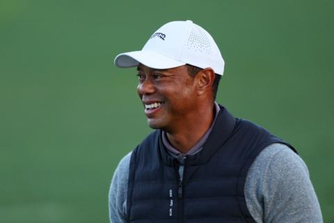 Tiger Woods smiles during day two of the Masters