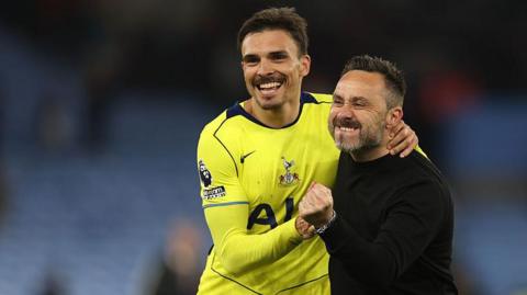 De Zerbi and Joao Palhinha celebrate