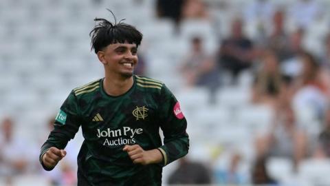 Farhan Ahmed smiles after taking a wicket for Notts Outlaws in the T20 Blast