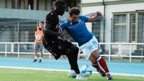 Linfield’s Adam Frizzell in action