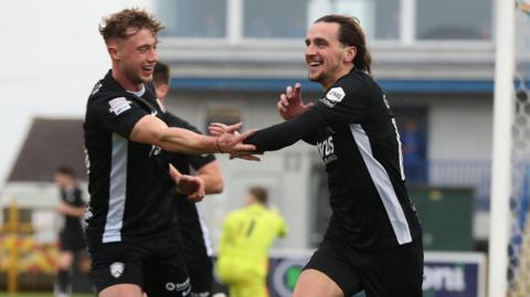 Matthew Shevlin and Jamie Glackin celebrate