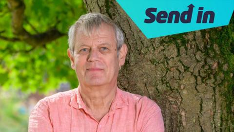 Axel Scheffler stands in front of a tree. A graphic in the top right says 'send in'