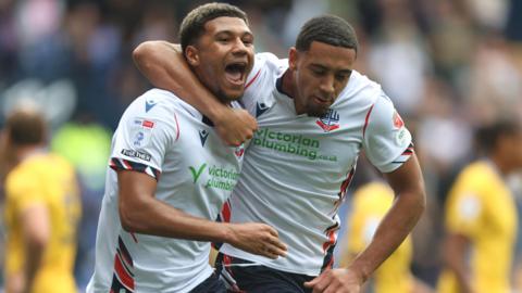 Mason Burstow celebrates scoring for Bolton