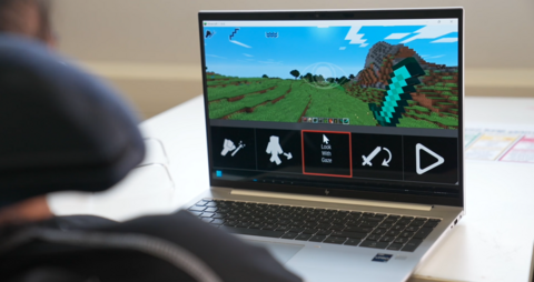 A pupil at Richard Cloudesley School in London uses MotionInput to play Minecraft