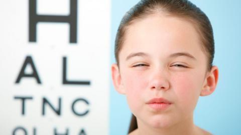 Girl doing an eyesight test