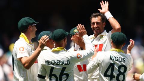 Australia and Mitchell Starc celebrate a wicket