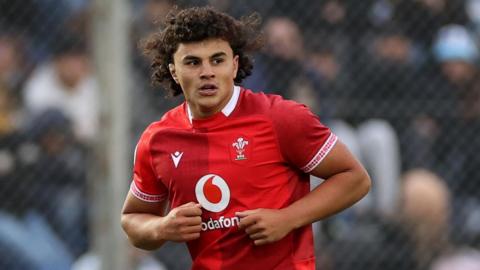 Kane James in red Wales jersey