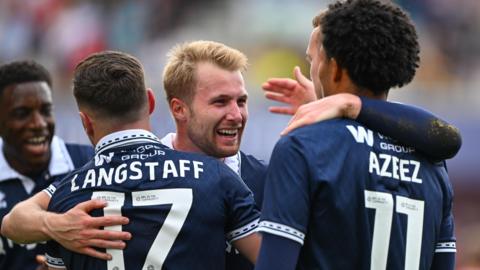Millwall players celebrate the goal in the 1-0 win over Middlesbrough