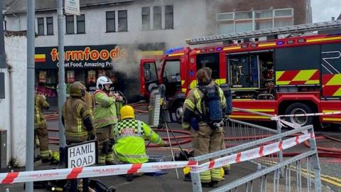 Fire crews at a Farmfoods store