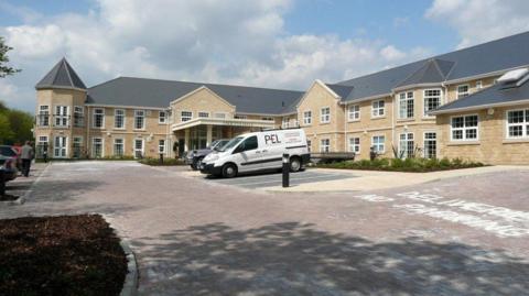 A picture showing the outside of Asquith Hall care home in Todmorden