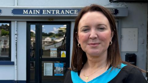 Siobhan McNulty standing outside her pharmacy