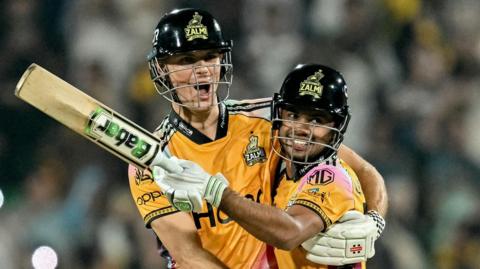 Aaron Hardie and Farhan Yousuf embrace after winning the Pakistan Super League