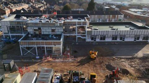 A half built large school building