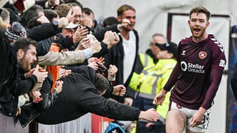 Stuart Findlay celebrates scoring for Hearts