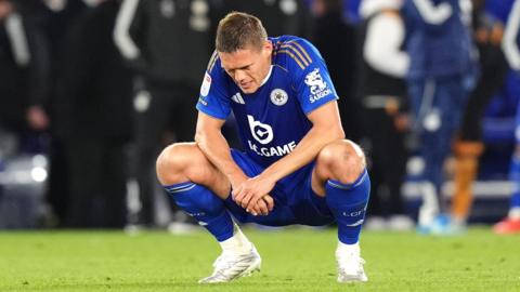Leicester City's Jannik Vestergaard reacts after a draw with Hull sees them relegated to League One