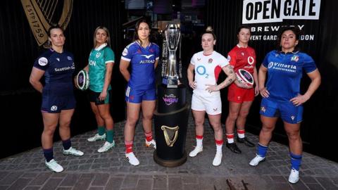 The six Women's Six Nations captains posing with the trophy