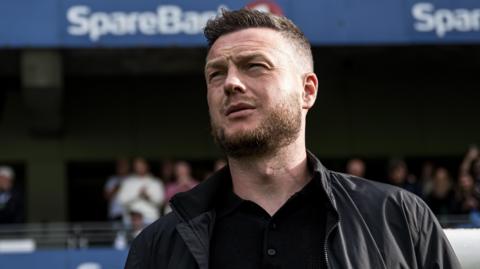 Kim Hellberg watching Hammarby play