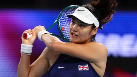 Emma Raducanu hits a backhand