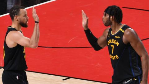 Stephen Curry (left) and Buddy Hield 