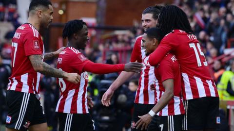 Exeter City celebrate a goal