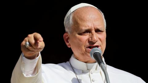 Pope Leo speaks in front of the Pavia Cathedral during his visit to Pavia, Italy, June 20, 2026.