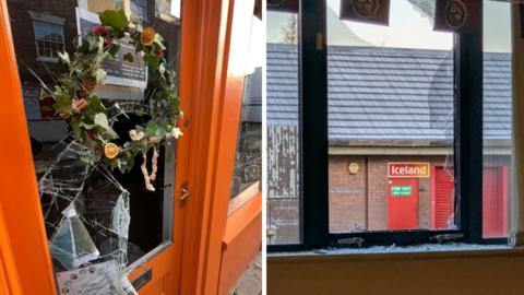Broken windows of the Dice Jail (left) and Sanctuary Gaming Centre & Coffee Shop (right) after they were broken into by thieves