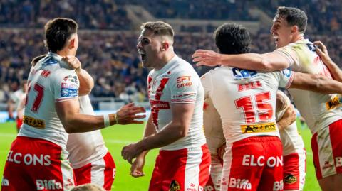St Helens players celebrate their dramatic win at Leeds