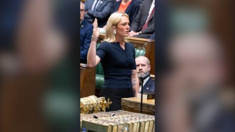 New SNP MP Lara Bird being sworn in as an MP in the House of Commons.