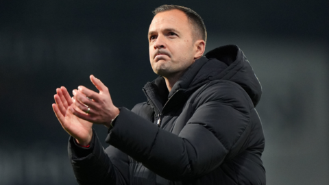 Birmingham City boss Chris Davies applauds the travelling fans after the 1-1 draw at West Brom