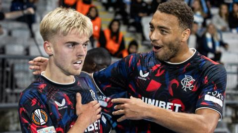 Rangers' Ross McCausland (L) celebrates scoring to make it 2-0