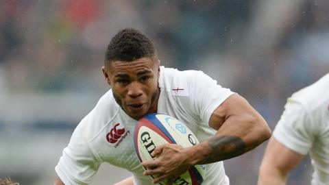 Kyle Eastmond playing for England against South Africa in 2014 at Twickenham