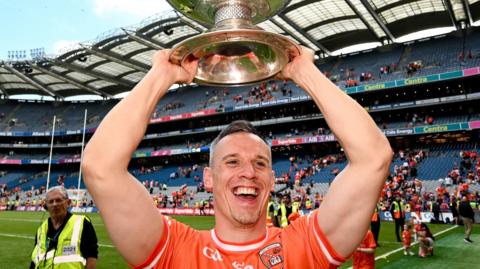 Mark Shields lifts the Sam Maguire Cup