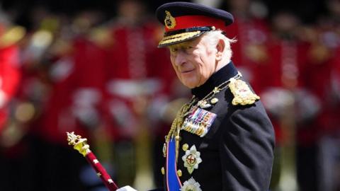 King Charles III during a ceremony to present the Grenadier Guards with their new Colours at Buckingham Palace in London on Tuesday June 9