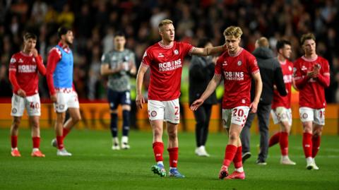 Bristol City players look dejected after the 3-0 loss to Sheffield United