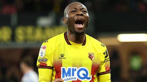 Edo Kayembe celebrates