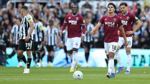 West Ham players react after Newcastle United score at St James' Park on 17 May, 2026