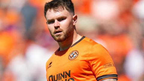 Glenn Middleton in action for Dundee United